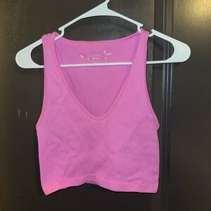 Pink ribbed cropped top.